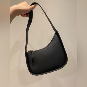 The Row Mini Half Moon bag